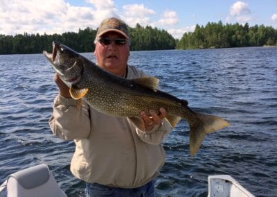 Guide Dennis with lake trout on Manitou