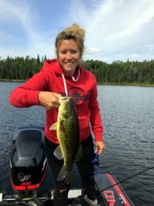 Woman largemouth bass fishing Ontario