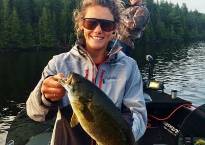 Woman bass fishing Ontario