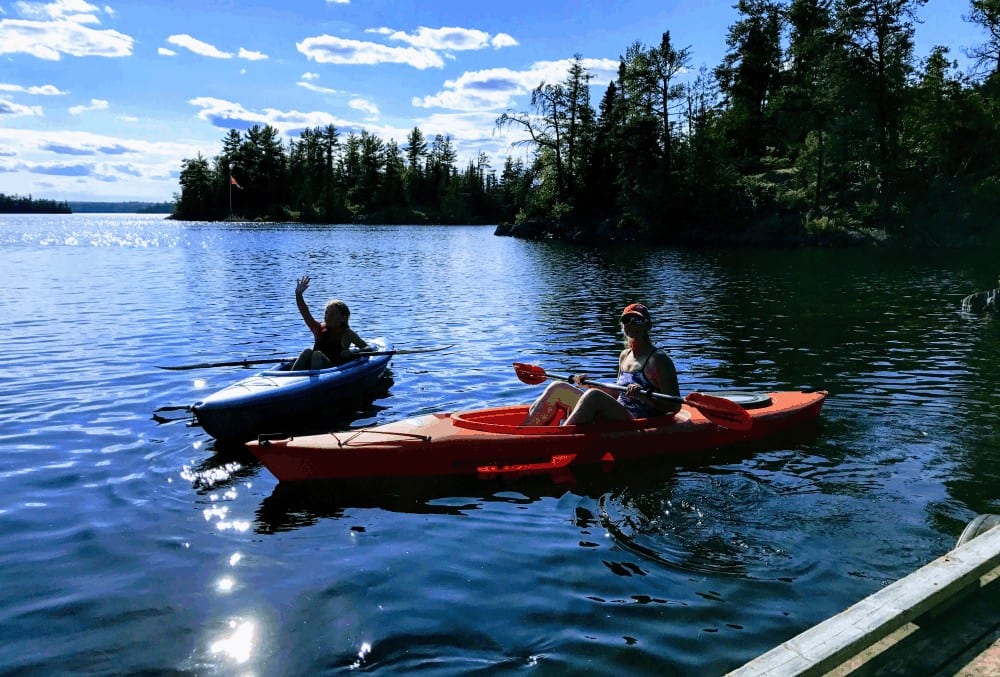 Kayak boating and fishing at our Ontario Camp