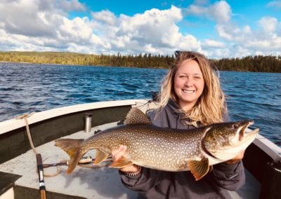 woman with Lake trout Ontario Manitou