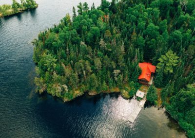 Aerial photo of Brigadoon Cabin using drone showing boat dock and front deck